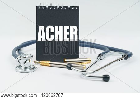 Medicine And Health Concept. On A White Background Lies A Stethoscope, A Pen And A Black Notebook Wi
