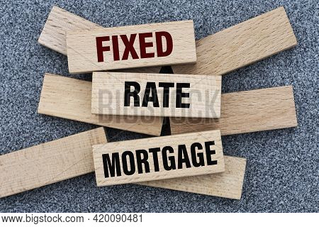 Fixed Rate Mortgage - Words On Wooden Bars On A Gray Background With A Free Space. Business Concept