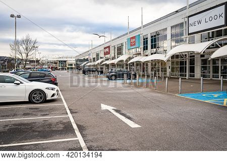 Swansea, Wales, Uk - February 7, 2021: Entrance And Car Park Of Morfa Shopping Park In Swansea, Outd