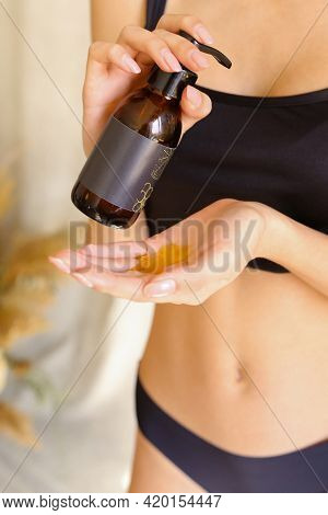 Closeup Shot Of Beautiful Female Hands Applying Moisturiser. Beauty Womans Hand Applying Cream