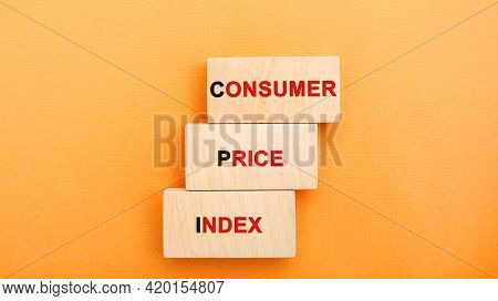 Wooden Blocks With The Words Consumer Price Index. Measuring The Average Level Of Change In Prices F