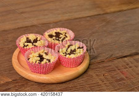 Malaysian Traditional Homemade Cookies Called As Kuih Sarang Burung On Wooden Plate Served During Ei
