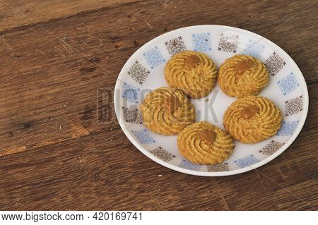 Biscoff Butter Cookies On White Plate. Malaysian Traditional Cookies Served During Eid Fitri