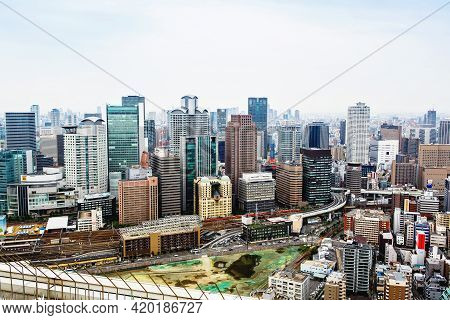 Osaka, Japan - 18 May, 2015: View From Above On Osaka City With Skyline With Skycrapers, Highways An