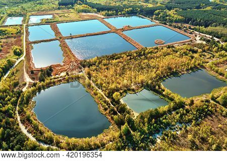 Aerial View Of Ponds For Collect Stormwater. Rainwater Retention Basins, Bird Eye View. Artifical Po