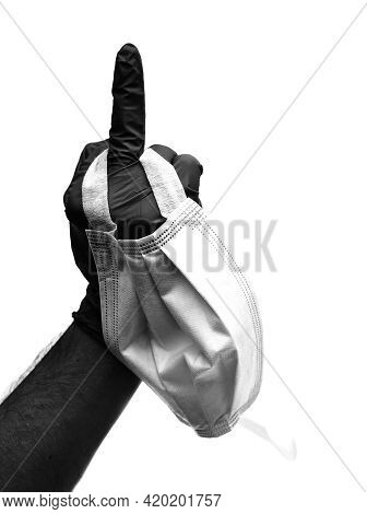 Hand With Surgical Glove With Middle Finger Raised As A Sign Of Offense In Sign Language And Surgica