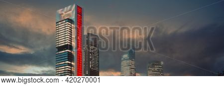 On Cloudy Gloomy Sky Background Illuminated With Lights Cuatro Torres Four Towers Business Area Nigh