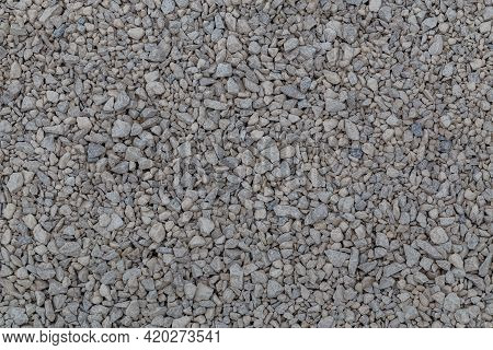 Dry White Limestone Ballast Flat Full Frame Background. Small Gray Dusty Broken Macadam Stones Textu