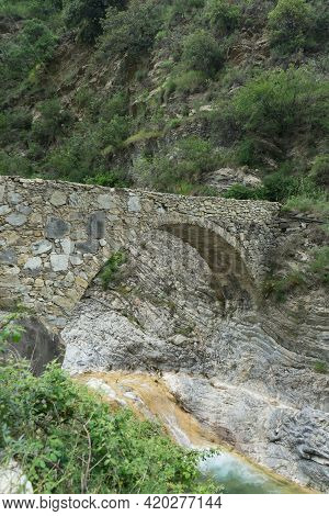 Stone Bridge In The Nervia Valley Near The Rio Barbaira Stream, Rocchetta Nervina, Liguria - Italy