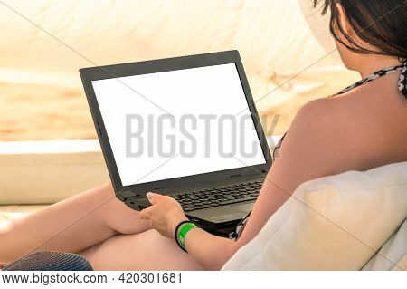 Female Freelancer Entrepreneur Lying In Beach Tent And Doing Remote Business Work At Modern Laptop C