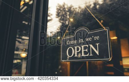 Come In, We Are Open - Open Sign Broad Hang On Entrance Door With Copy Space At Coffee Shop Or Resta