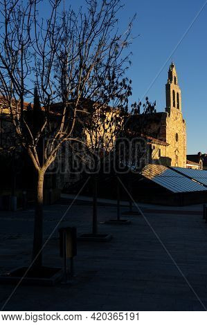 Astorga, Spain - January 04, 2021: Perpetuo Socorro De Los Redentoristas Church Reflected In A Glass