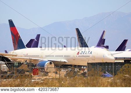 May 12, 2021 In Victorville, Ca:  Modern 777 Aircraft Stored In The Victorville, Ca Airplane Graveya