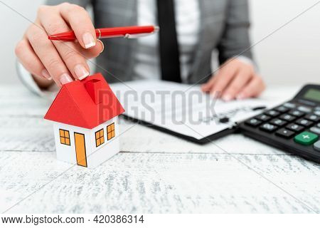 Lady Presenting New Home Savings Deals In Outfit, Business Woman Showing Possible Investment Oppurti