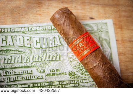 Paris - France - March 23, 2021 : Partagas Cuban Cigar On Vintage Wooden Box With Cuban Official Tax