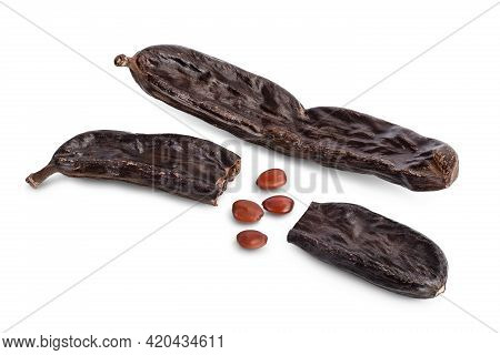Ripe Carob Pods And Bean Isolated On White Background With Clipping Path And Full Depth Of Field