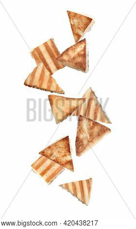 Delicious Crispy Pita Chips Falling On White Background