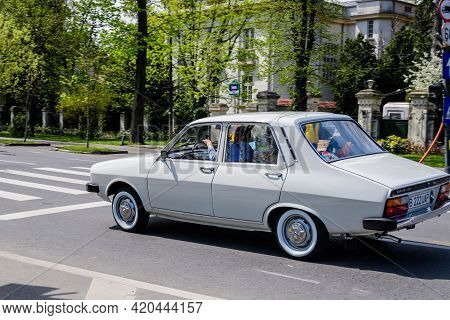 Bucharest, Romania, 24 April 2021 Old Retro White Romanian Dacia 1310 Classic Car In Traffic In A St