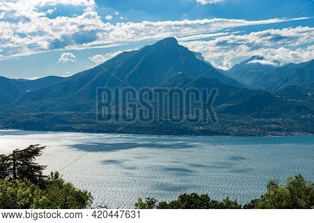 Aerial View Of The Lake Garda (lago Di Garda) And Italian Alps, Mountain Peak Of Monte Pizzocolo Als