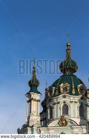 Green Domes Of The Kiev-pechersk Lavra Church Against The Blue Sky