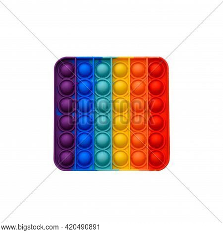 Rainbow Pop It Fidget Toy Isolated On White. Poppit - New Fidget Game On Empty White Copy Space Back