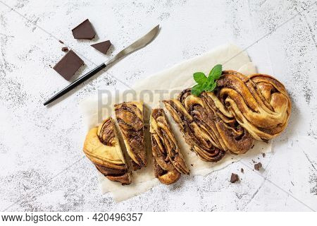 Fresh Pastries, Chocolate Day. Chocolate Babka Or Brioche Bread. Sweet Yeast Dough With Chocolate Fi