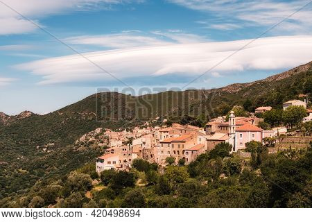 Lenticular Clouds Hang Over The Mountains Behind The Village Of Costa In The Balagne Region Of Corsi