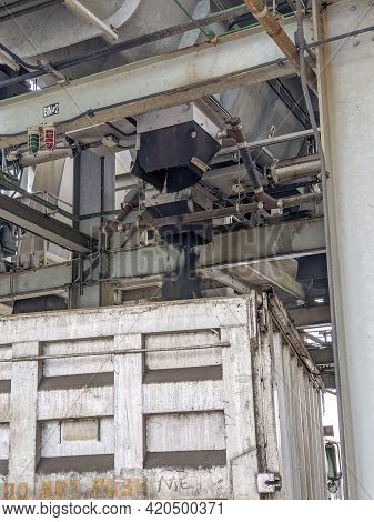 Biosolids Structure Distributing Recycled Sludge To A Dump Truck