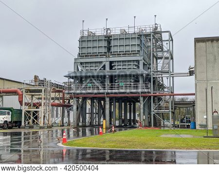 Biosolids Structure Distributing Recycled Sludge To A Dump Truck