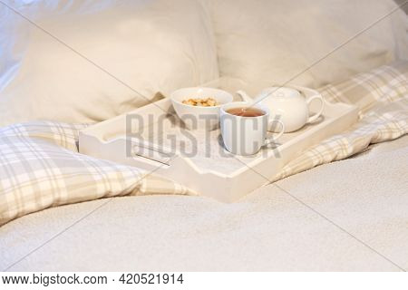 Morning Breakfast At Bed - Striped Teaset On Breakfast Tray In Bedroom