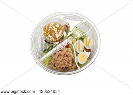 Fresh Tuna Salad With Lettuce, Cucombers, Cherries And Eggs In Plastic Container.  Top View.
