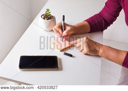 Business, Education And People Concept - Close Up Of Female Hands With Papers, Stickers And Eyeglass