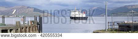 Ferry Ship Arriving At Scottish Island Of Rothersay
