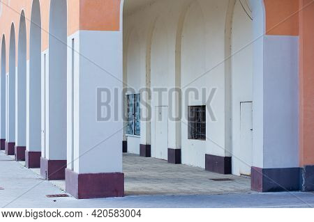 Tresigallo,italy-may 2, 2021:detail Of The Porch Located In Piazza Della Repubblica