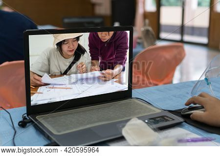 Two Asian Designer Web Development Team Website Dicussion Seriously Of Template Design For User Ui A