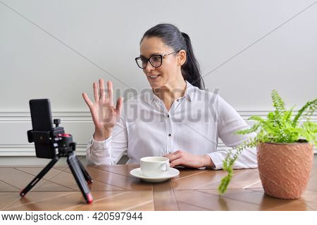 Young Woman Blogger Vlogger Recording Broadcast At Home
