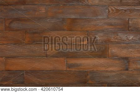 Dark Brown Textured Wooden Background Made From Horizontal Planks With Knots And Grain.