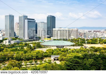 View From Above On Osaka City With Skyline With Skycrapers, Highways And Parks From Top Of Osaka Cas