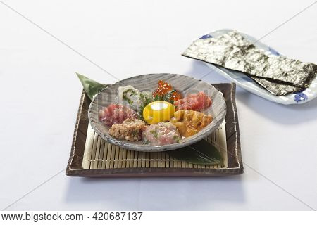 Salmon Natto Yukke With Seaweed On White Background. Japanese Food.