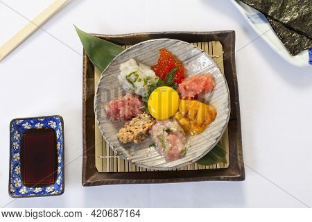 Salmon Natto Yukke With Seaweed On White Background. Japanese Food.
