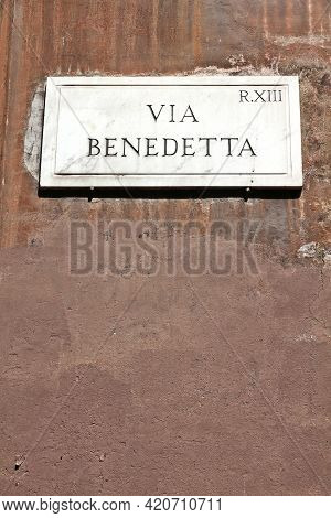 Trastevere District (rione Trastevere). Via Benedetta - Old Street Name Sign In Rome, Italy.