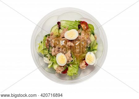 Fresh Tuna Salad With Lettuce, Cucombers, Cherries And Eggs In Plastic Container.  Top View.