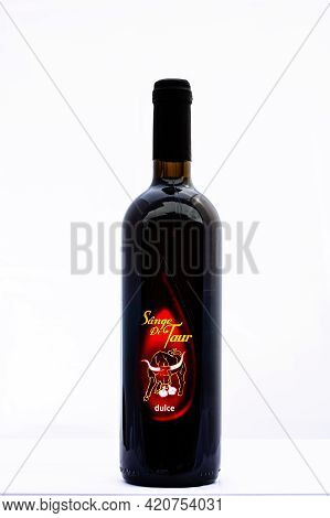 Bottle Of Sange De Taur Wine Isolated On White. Illustrative Editorial Photo Shot In Bucharest, Roma