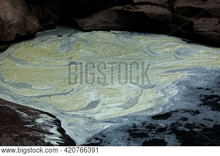 The Texture Of Water On The Surface Of A Small Waterfall In The Ukrainian Steppe Close-up. Tokovsky