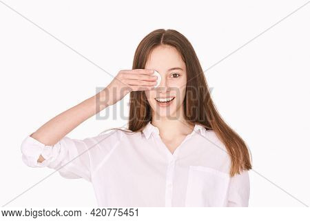Pretty Girl Indoor Portrait. Light Background. Female Teenager Person. Long Brow Hair. Cleansing Dir