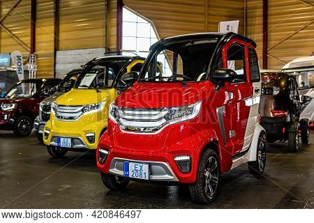 Riga, Latvia, September 25, 2020: Dt Motor Power One Mini Electric Cars At A Motor Show