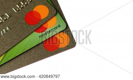 3 Plastic Mastercard Cards On White | Closeup Of Credit Cards
