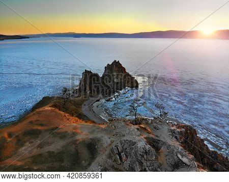 Beautiful Aerial View Of Cape Burhan Or Shamanka Rock, Olkhon Island. Lake Baikal In The Spring Duri