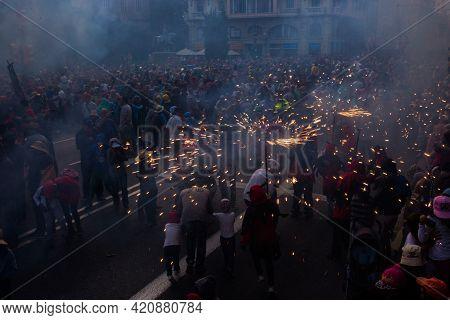 Barcelona, Spain, Sept 22, 2018 - Traditional Correfoc And Costumed Devils Procession On Via Laietan