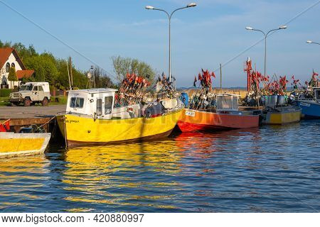 Krynica Morska, Poland - May 15, 2021: Fishing Boats Docked In Port Of Krynica Morska On Vistula Spi